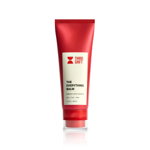 Red tube of 'The Everything Balm' by Third Shift on a white background