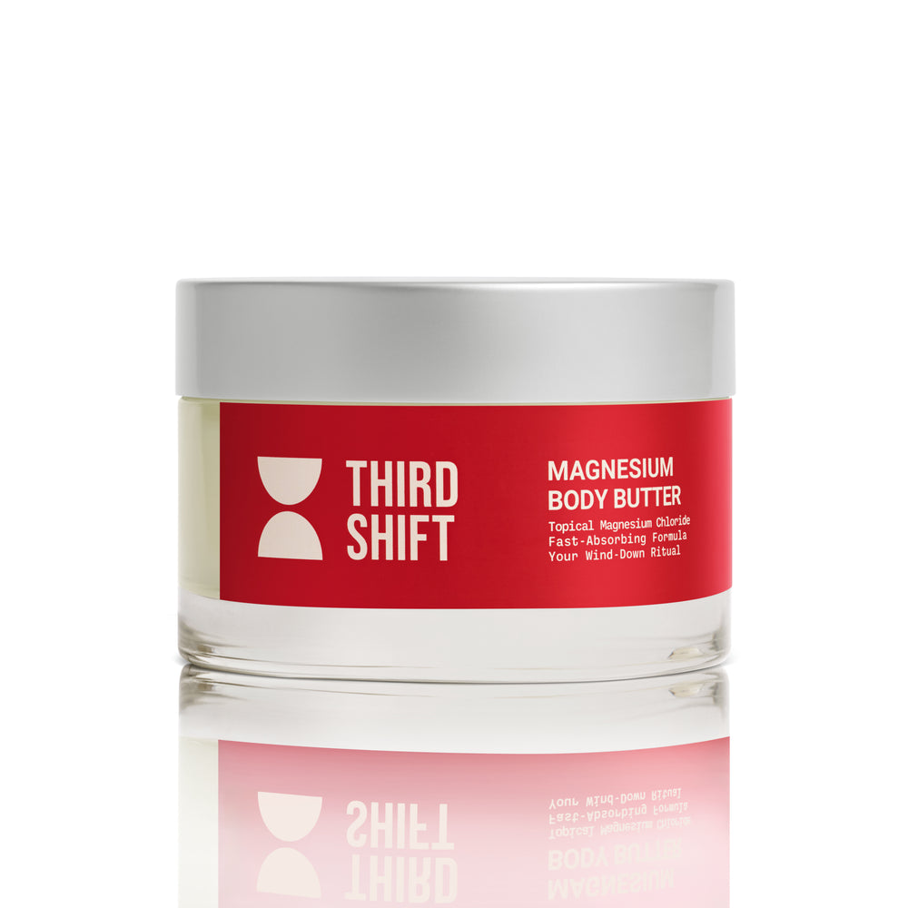 Red jar of Third Shift magnesium body butter on a red background